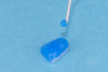 (19.) The fractured composite fragment after sandblasting as a surface treatment, followed by etching and application of a single layer of silane, prepared for reattachment.